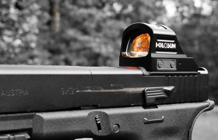 Holosun optic mounted on a pistol
